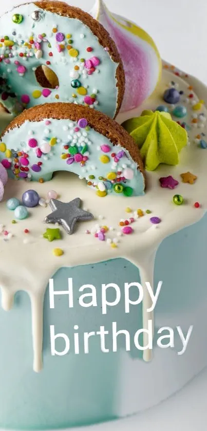 Colorful birthday cake with decorations and 'Happy Birthday' text.