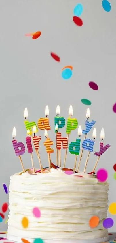 A colorful birthday cake with candles and falling confetti.