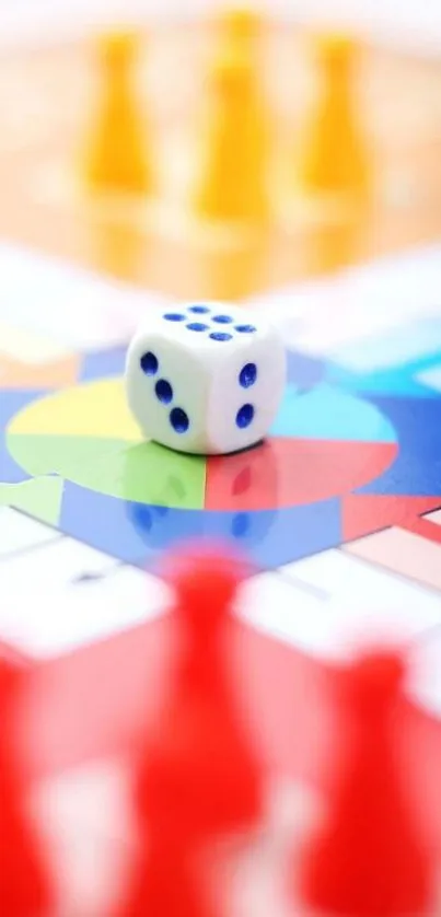 Colorful board game with dice and red pawns in focus.