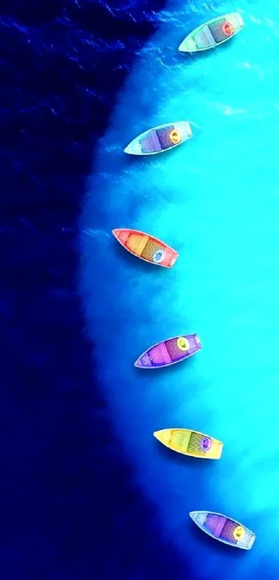 Colorful boats on vivid blue ocean wallpaper.