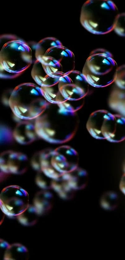 Vibrant iridescent bubbles against a dark background on mobile wallpaper.