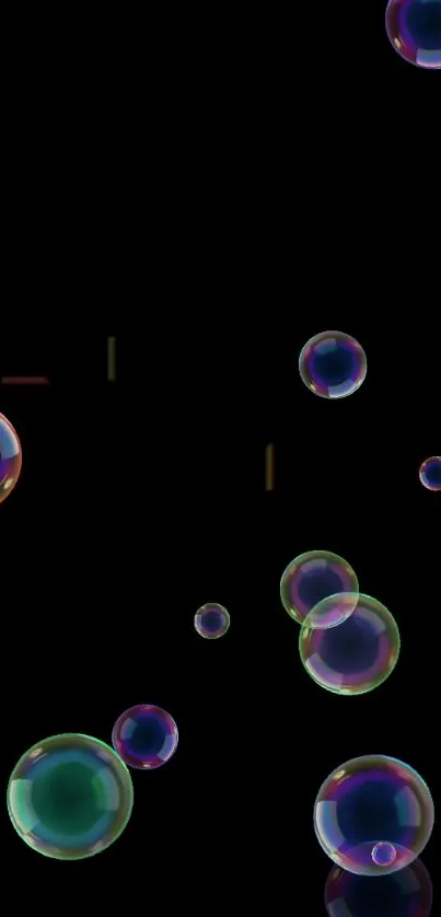 Colorful bubbles floating on a black background wallpaper.