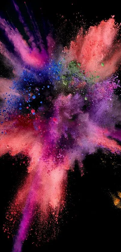 Vibrant colorful explosion on black background wallpaper.