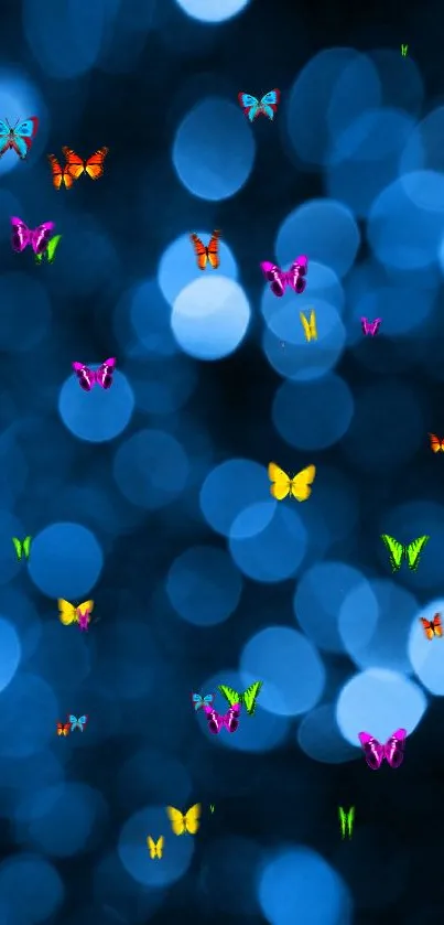 Colorful butterflies on a blue bokeh background wallpaper.