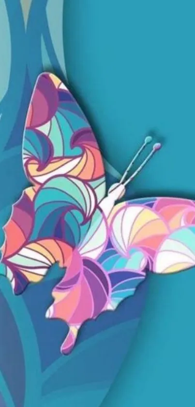 Colorful artistic butterfly on teal background.