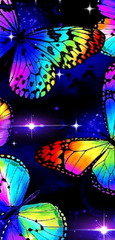 Colorful neon butterflies on dark blue background wallpaper.