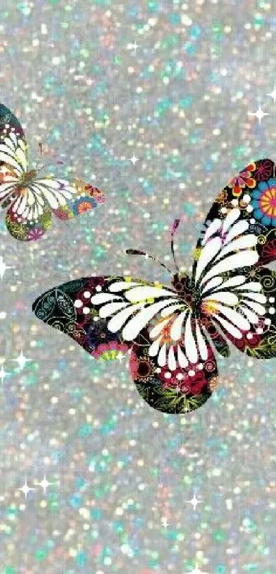 Colorful butterflies on a sparkling silver background.