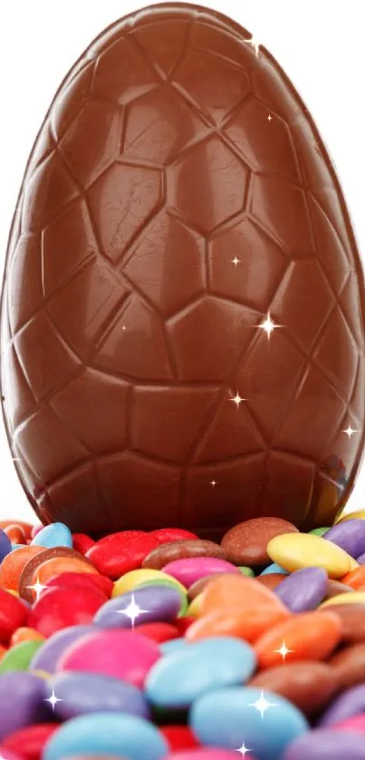 Chocolate egg with colorful candies background.