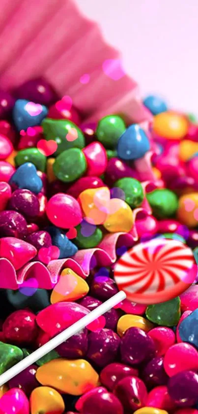 Colorful candy-themed wallpaper with pink, green, and blue sweets.