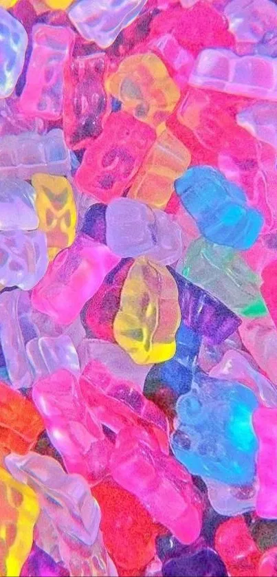 Bright and colorful gummy bear candies scattered across a vibrant surface.