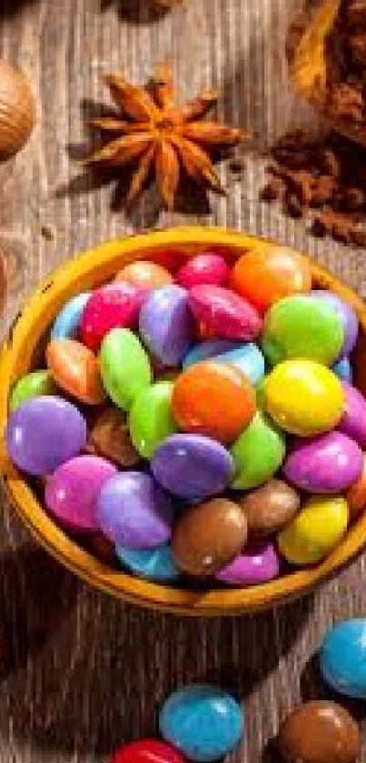 Colorful candies in a wooden bowl with rustic background.