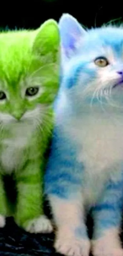 Colorful kittens in green and blue hues on wallpaper.