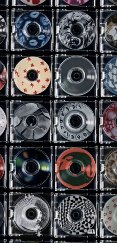 Mobile wallpaper with colorful CD collection in a grid.