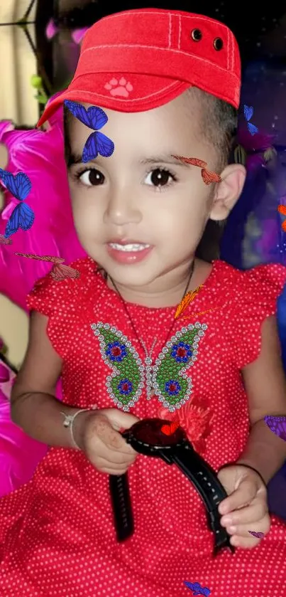 Child in red dress with colorful butterflies.