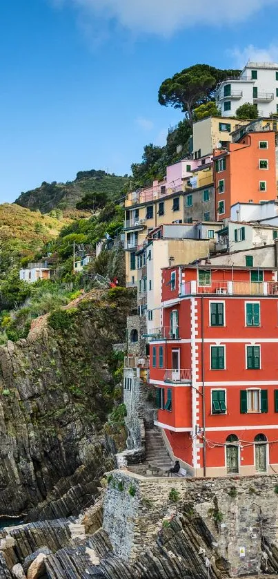 Colorful seaside buildings of Cinque Terre with a blue ocean view.