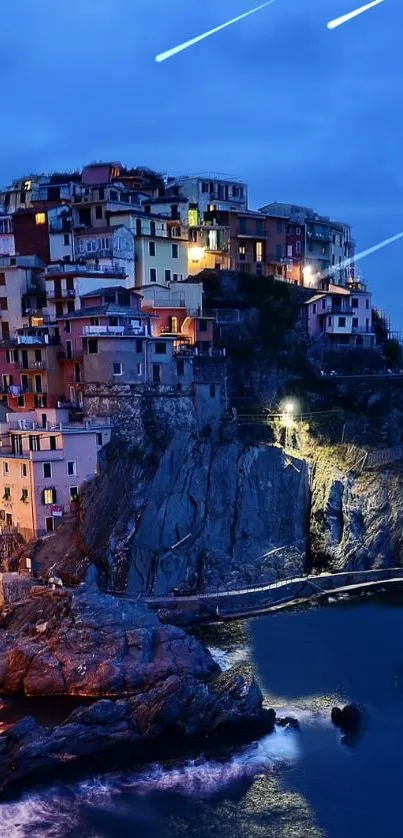 Colorful coastal cityscape at night with ocean view.