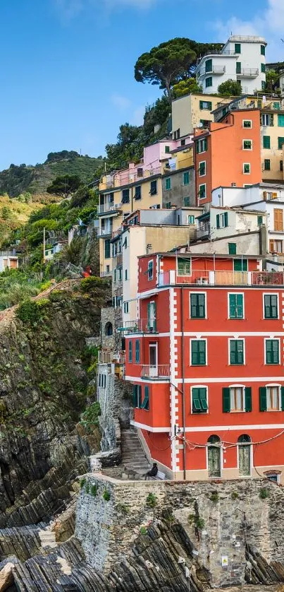 Colorful Italian coastal village overlooking the ocean, perfect for mobile wallpaper.