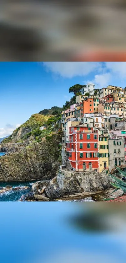 Cinque Terre coastal village with colorful buildings and blue sea.