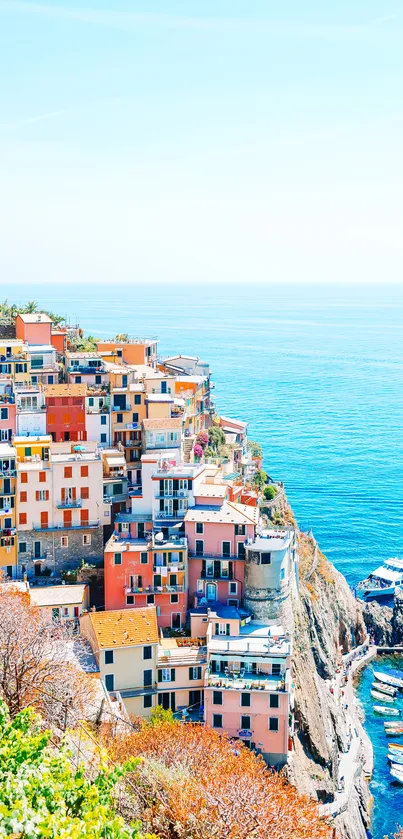 Vibrant Cinque Terre village overlooking the blue sea.