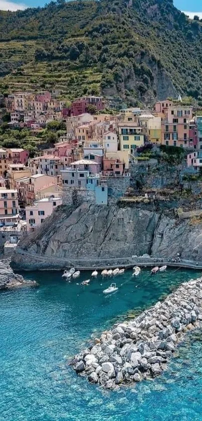 Colorful houses by the sea with turquoise water.