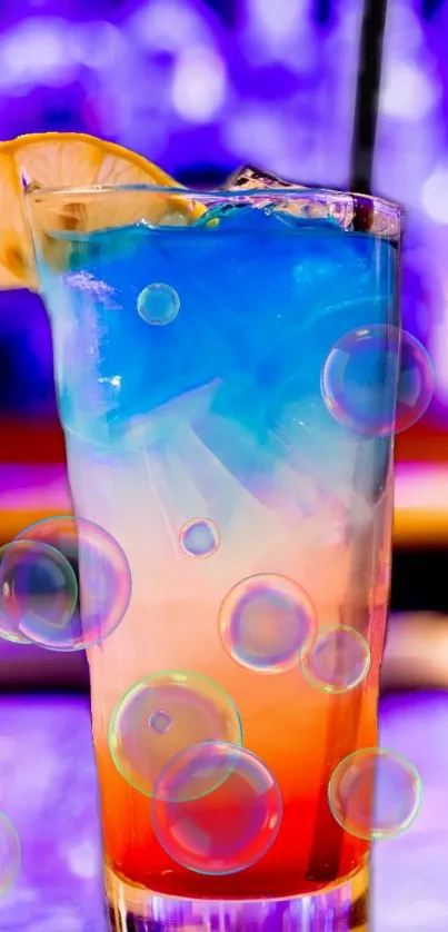 Colorful cocktail with bubbles and a lemon slice in a vibrant setting.