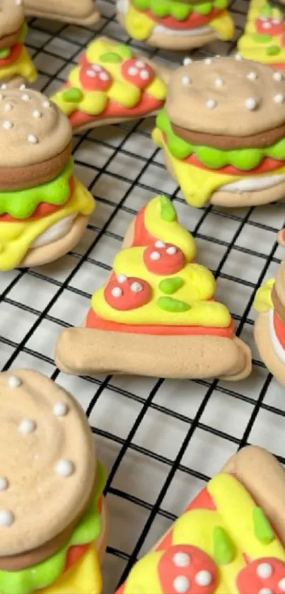 Colorful cookies shaped like burgers and pizza on a grid.