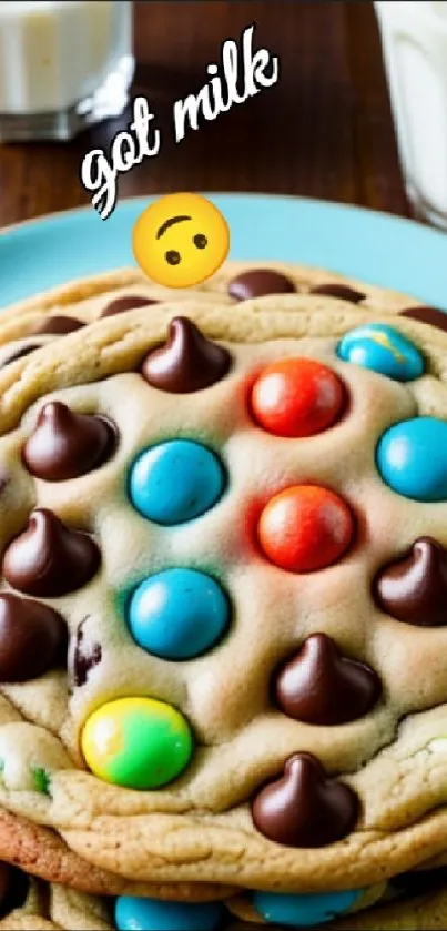 Stacked colorful chocolate cookies on a blue plate.