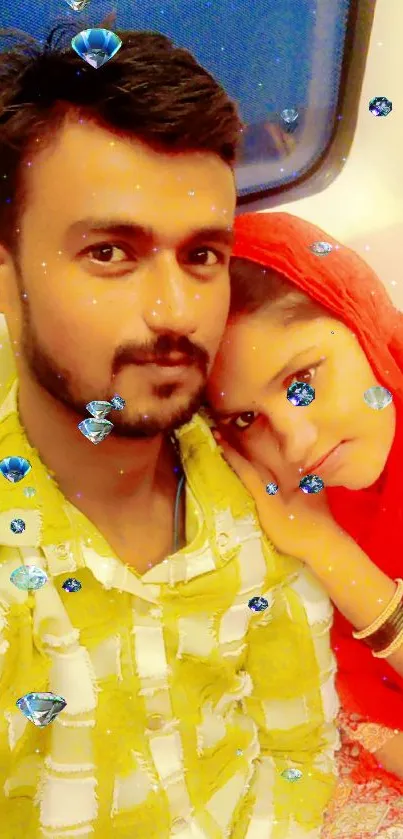 Couple with colorful attire and sparkling jewels in a vibrant setting.