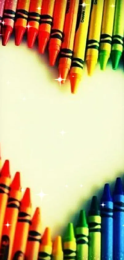 Colorful arrangement of crayons forming a heart shape on a mobile wallpaper.