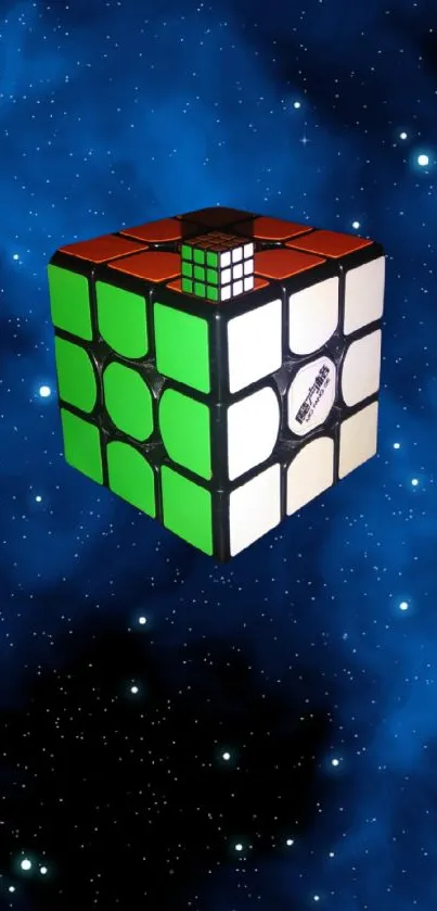 Colorful Rubik's Cube floating in space with a dark blue galactic background.