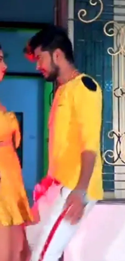 Vibrant couple dancing in yellow attire.