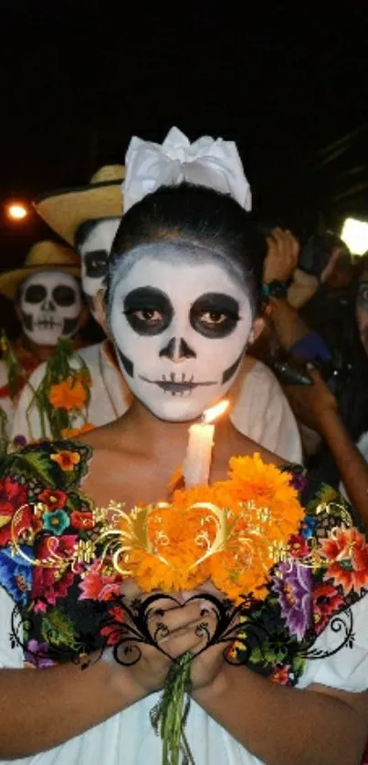 Day of the Dead celebration with colorful face paint and flowers.