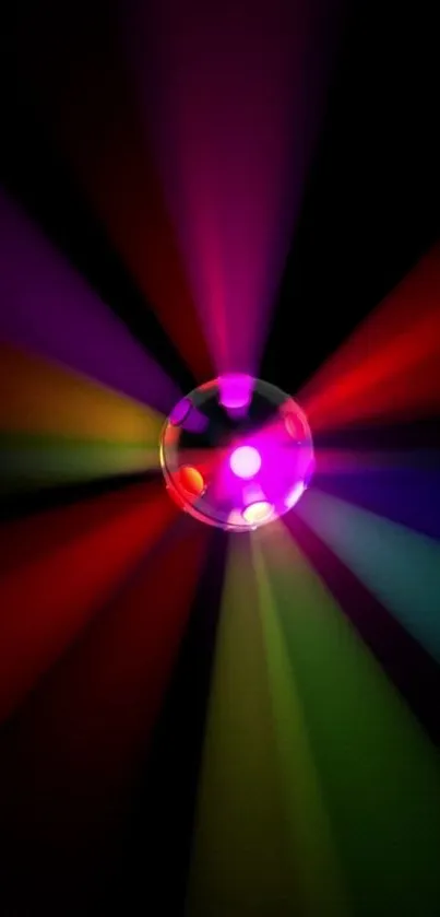 Vibrant disco ball with colorful light beams on a black background.