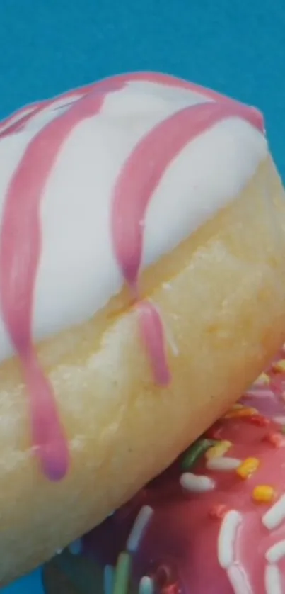 Vibrant donut wallpaper with pink icing and sprinkles on a blue background.