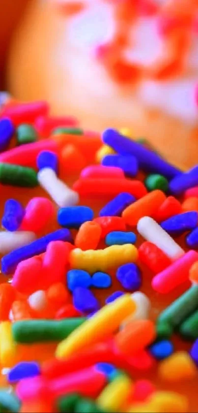 Colorful donut with rainbow sprinkles close-up.