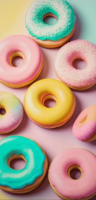 Colorful array of donuts in pastel hues on a mobile wallpaper background.