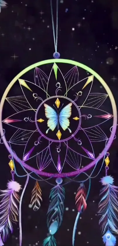 Colorful dreamcatcher with butterfly and feathers on a black background.