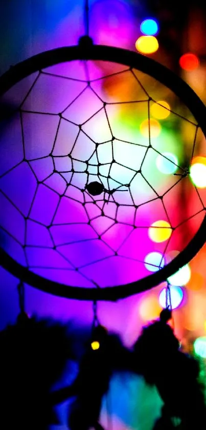 Dreamcatcher with colorful bokeh lights in the background.