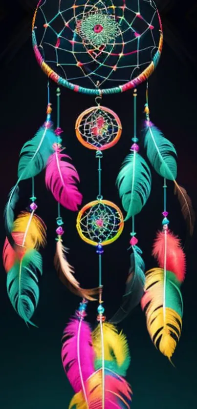 Vibrant dreamcatcher with colorful feathers on a dark background.