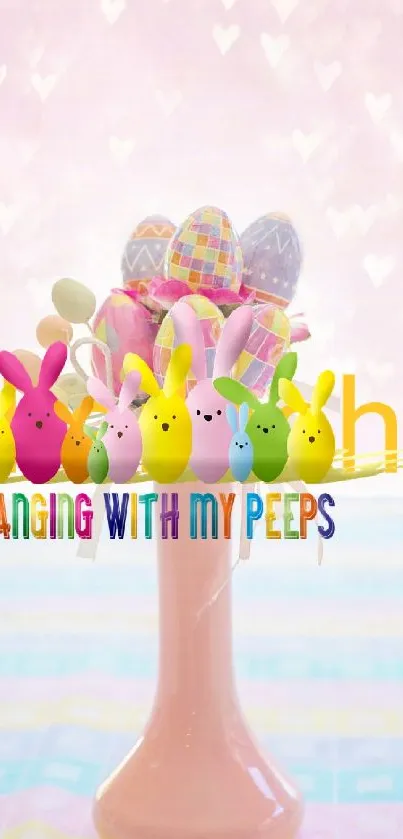 Colorful Easter bunnies and decor against a pink backdrop with hearts.