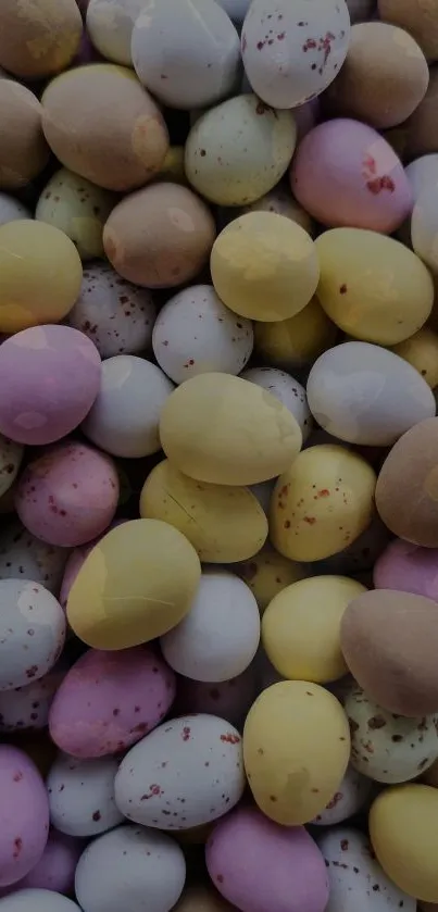 Pastel colored Easter eggs piled together in a vibrant and cheerful pattern.