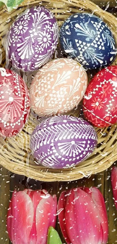 Colorful Easter eggs in a basket with tulips and green leaves.