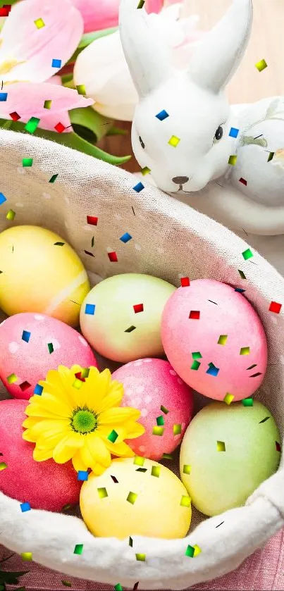 Easter eggs in basket with bunny figurine and confetti.