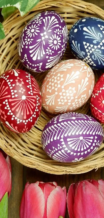 Colorful Easter eggs in a wicker basket with tulip accents.