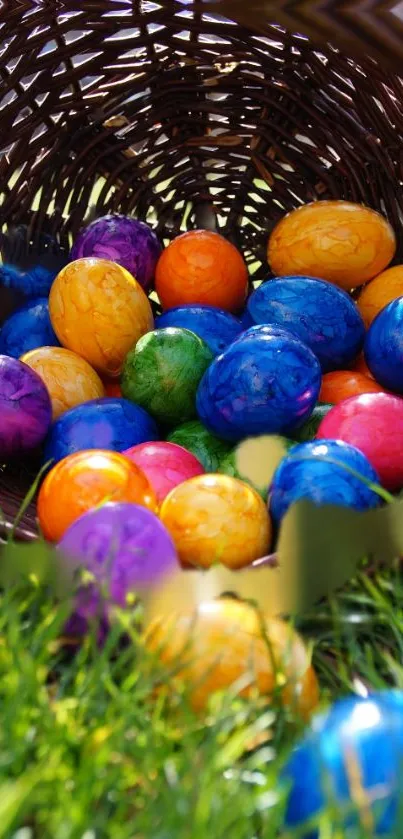 Mobile wallpaper of colorful Easter eggs in a basket on green grass.