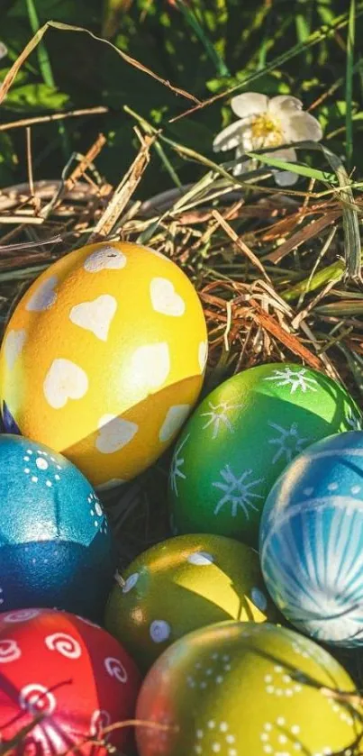 Vibrant Easter eggs nestled in grass.