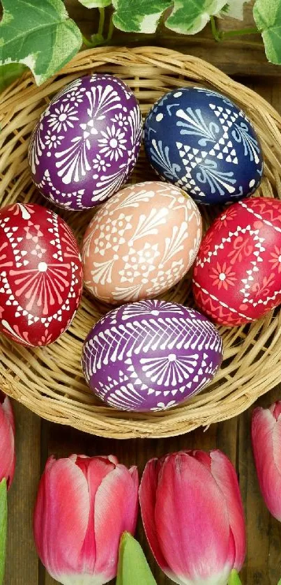 Colorful Easter eggs in a basket with tulips on a wooden background.
