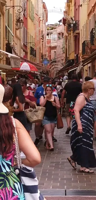 Busy European street with colorful buildings and visitors.