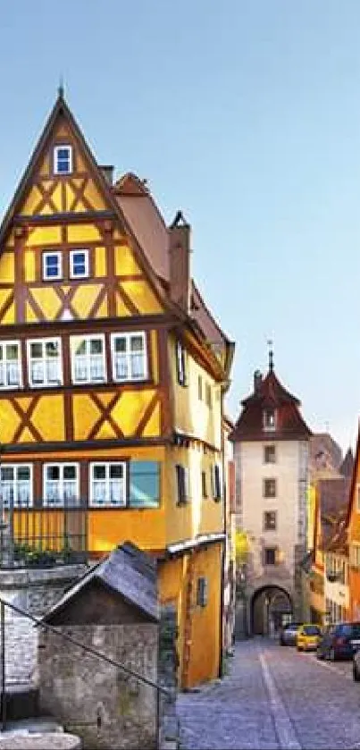 Colorful European village with traditional houses and cobblestone streets.