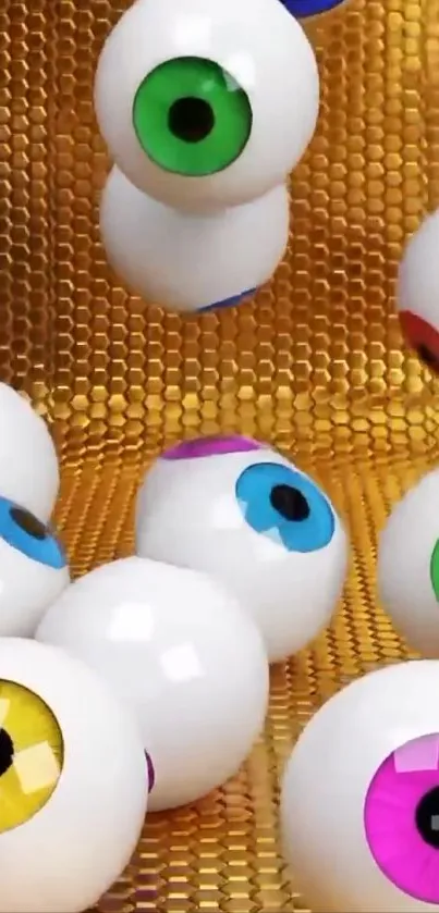 Colorful eyeballs on a gold textured background wallpaper.